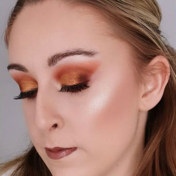 Woman showing lashes with her eys shut